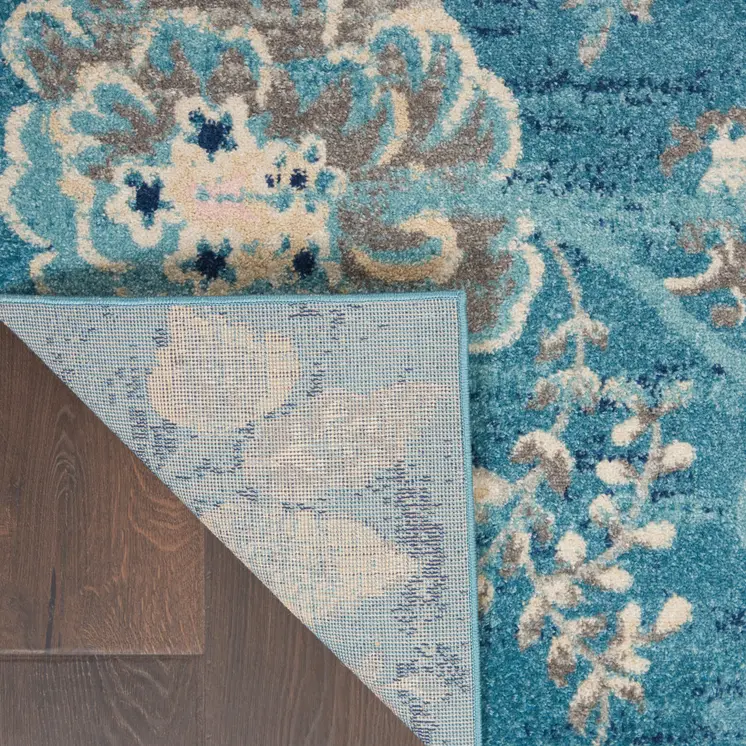 5' X 7' Turquoise Cream and Navy Blue Floral Distressed Area Rug