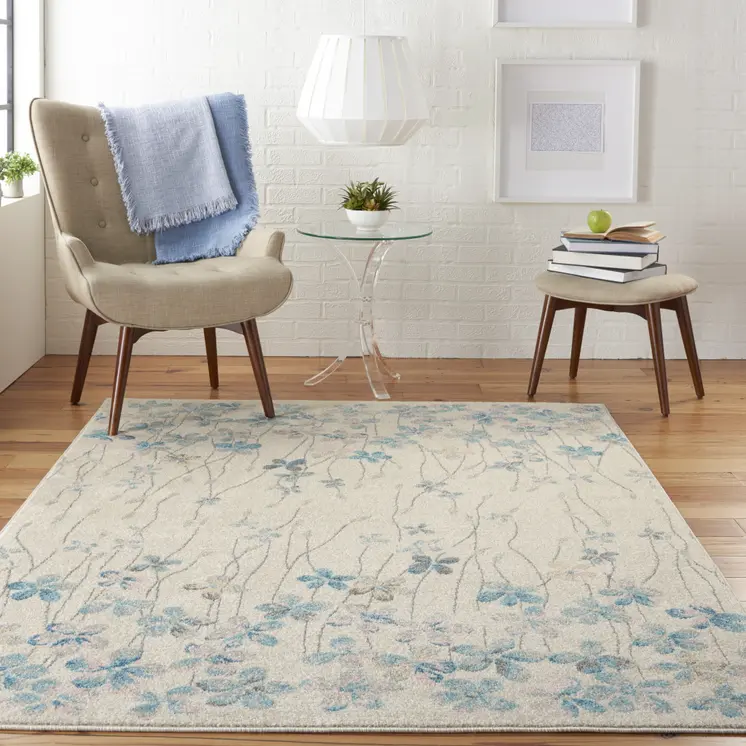 5' X 7' Ivory And Blue Floral Area Rug