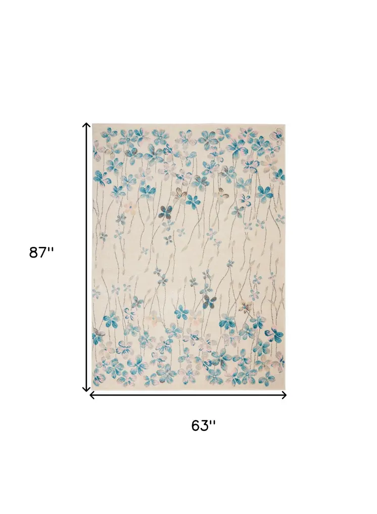 5' X 7' Ivory And Blue Floral Area Rug