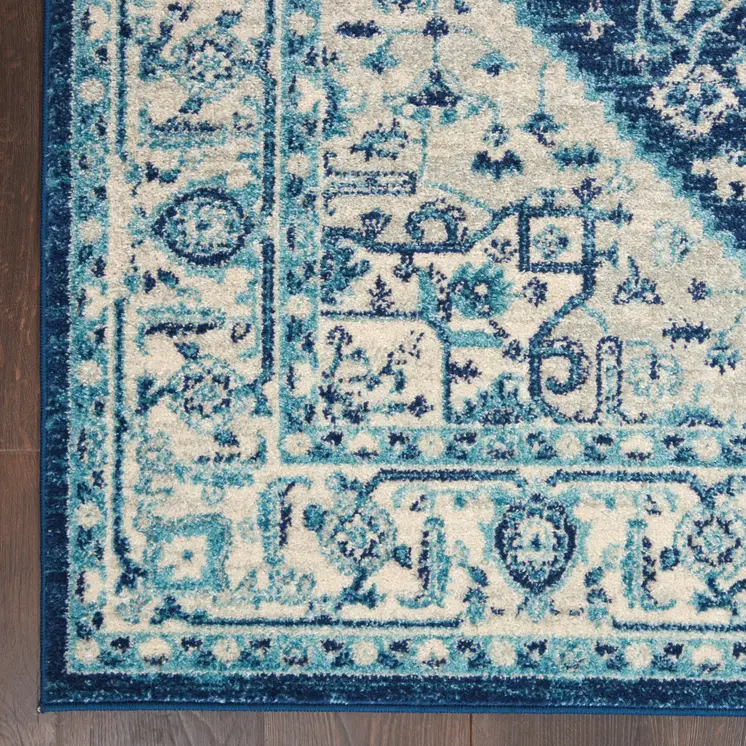 6' X 9' Ivory And Navy Blue Floral Medallion Distressed Area Rug