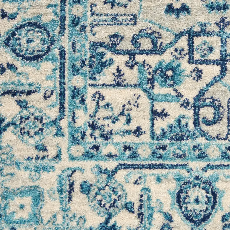 6' X 9' Ivory And Navy Blue Floral Medallion Distressed Area Rug