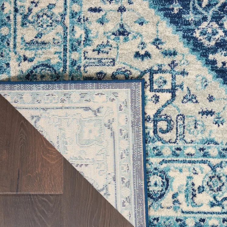 6' X 9' Ivory And Navy Blue Floral Medallion Distressed Area Rug