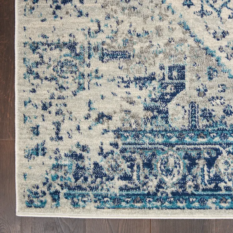 6' X 9' Ivory And Light Blue Floral Medallion Distressed Area Rug