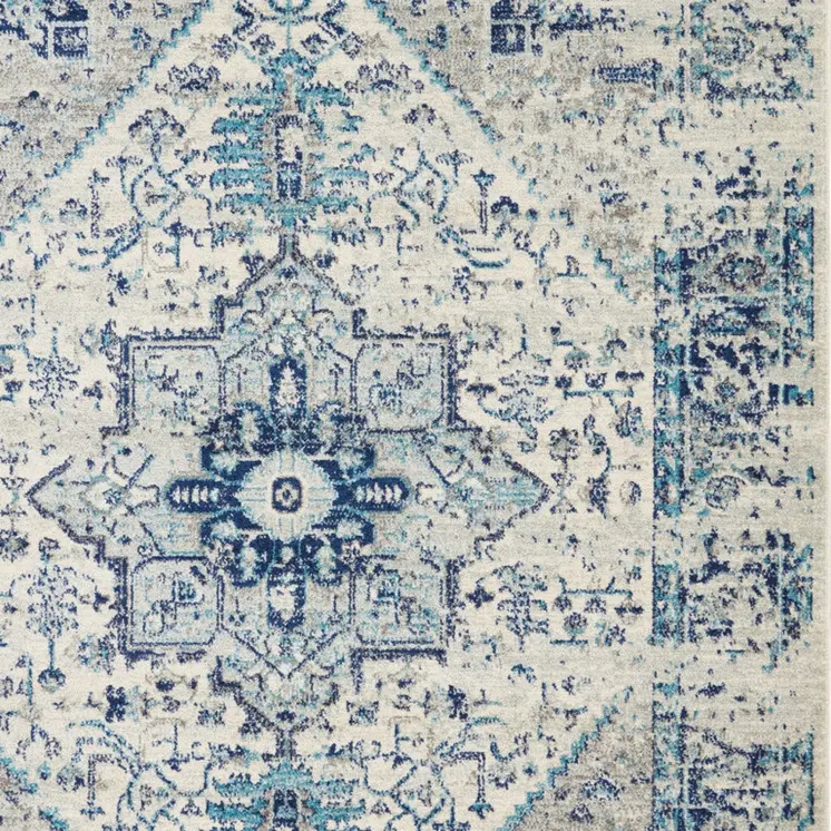 6' X 9' Ivory And Light Blue Floral Medallion Distressed Area Rug
