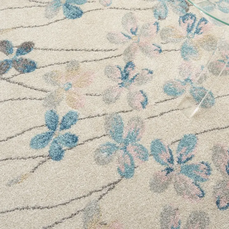 6' X 9' Ivory And Blue Floral Area Rug