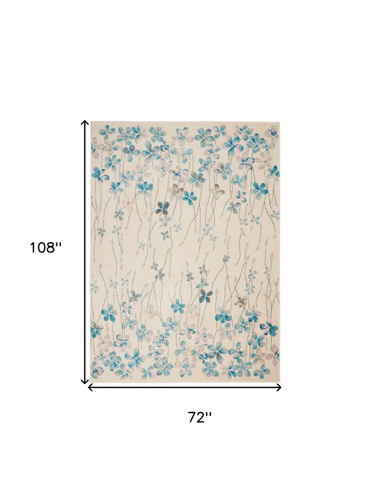 6' X 9' Ivory And Blue Floral Area Rug