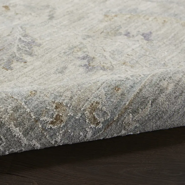 5' X 8' Beige and Gray Floral Power Loom Area Rug
