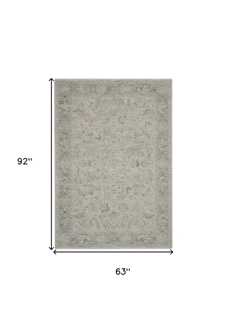 5' X 8' Beige and Gray Floral Power Loom Area Rug