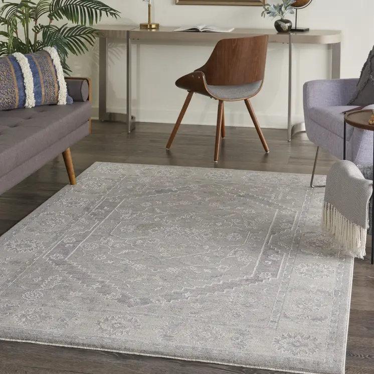 5' X 8' Beige and Gray Floral Medallion Power Loom Area Rug