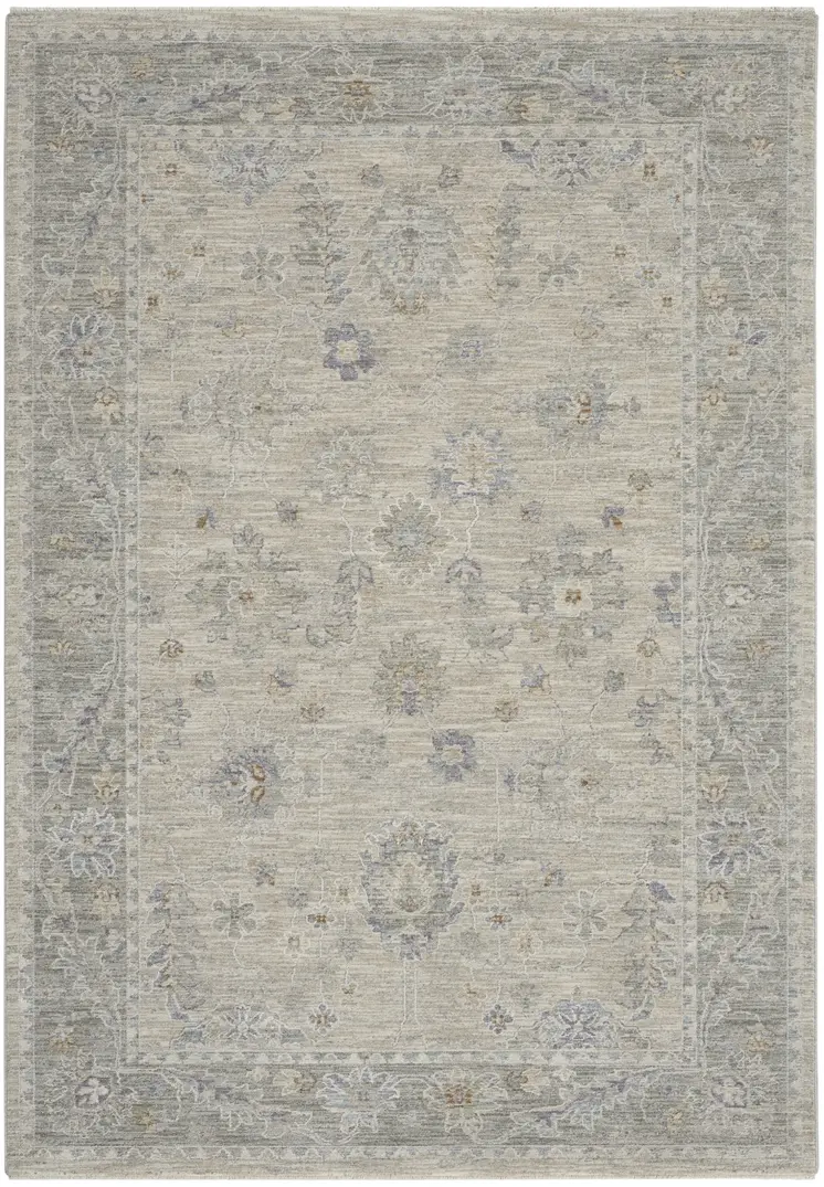 5' X 8' Beige and Gray Floral Power Loom Area Rug