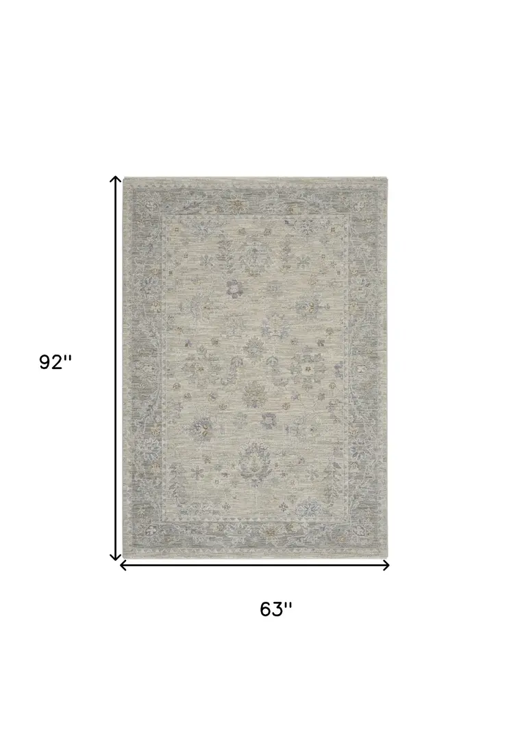 5' X 8' Beige and Gray Floral Power Loom Area Rug