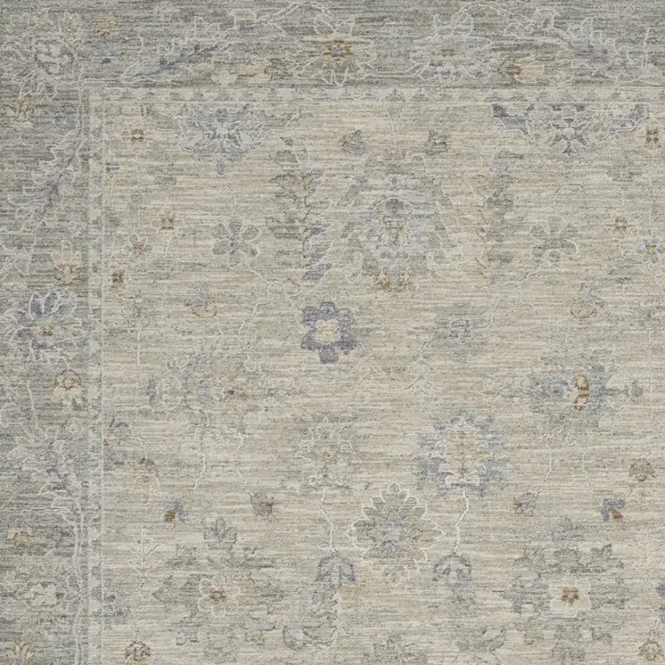 5' X 8' Beige and Gray Floral Power Loom Area Rug