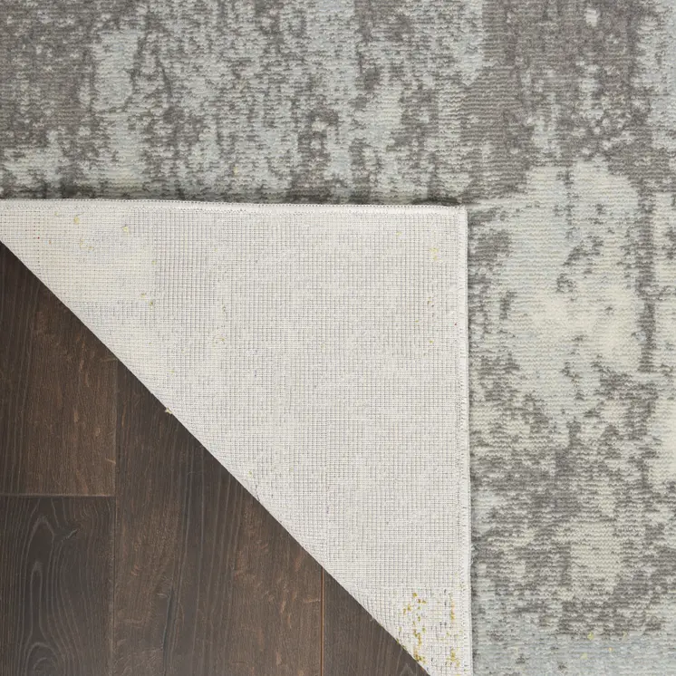 4' X 6' Gray Ivory and Light Blue Abstract Non Skid Area Rug