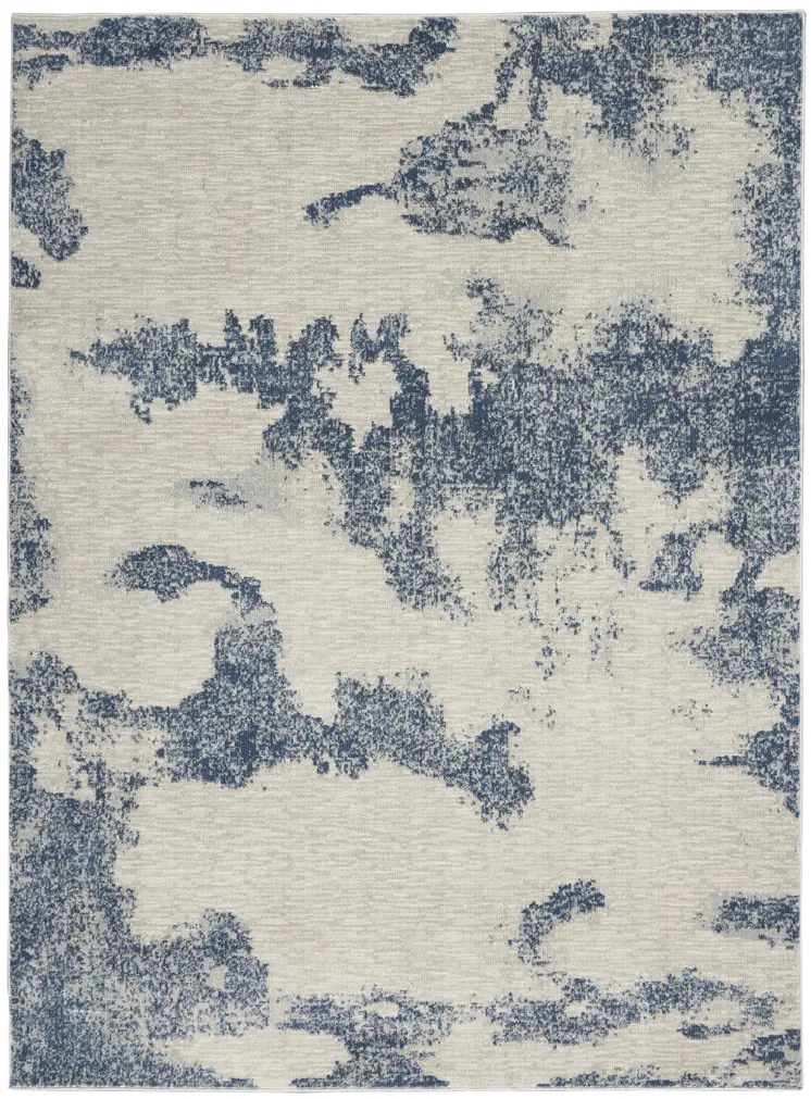 4' X 6' Light Blue and Ivory Abstract Non Skid Area Rug