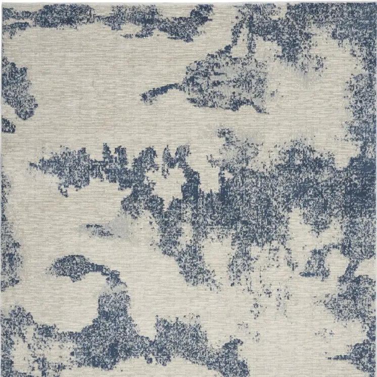 4' X 6' Light Blue and Ivory Abstract Non Skid Area Rug
