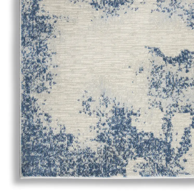 4' X 6' Light Blue and Ivory Abstract Non Skid Area Rug