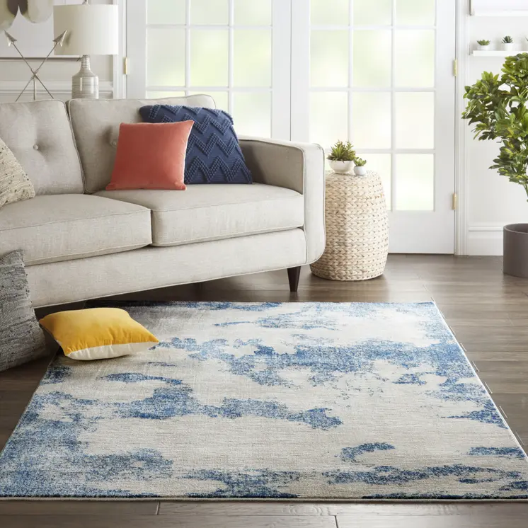 4' X 6' Light Blue and Ivory Abstract Non Skid Area Rug