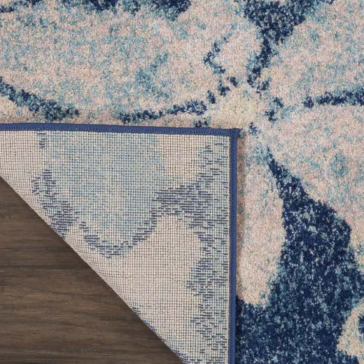 5' X 7' Navy Blue and Ivory Floral Area Rug