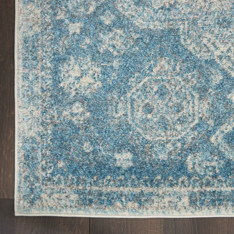 7' X 10' Ivory and Light Blue Geometric Distressed Area Rug