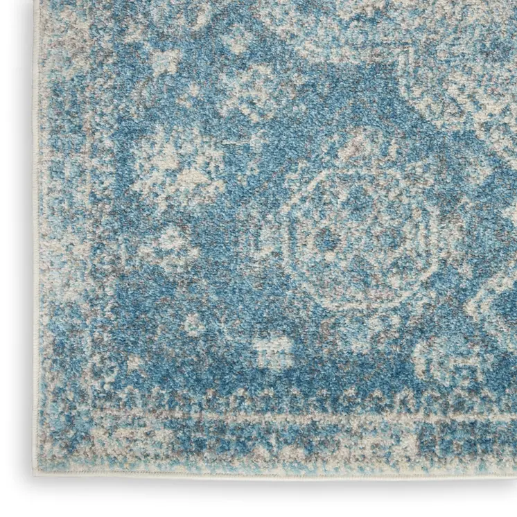 7' X 10' Ivory and Light Blue Geometric Distressed Area Rug