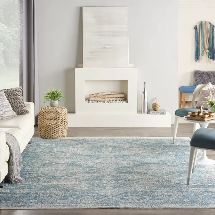 7' X 10' Ivory and Light Blue Geometric Distressed Area Rug