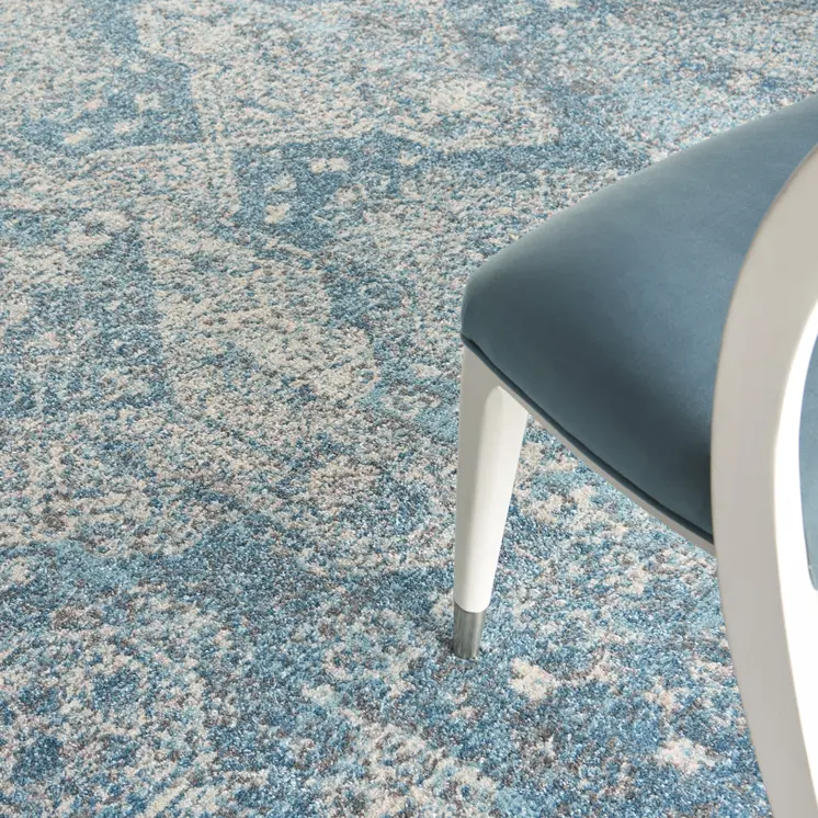 7' X 10' Ivory and Light Blue Geometric Distressed Area Rug