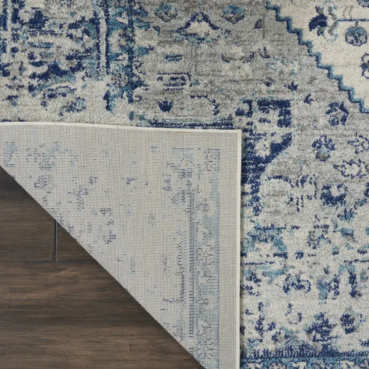 7' X 10' Ivory And Light Blue Floral Medallion Distressed Area Rug