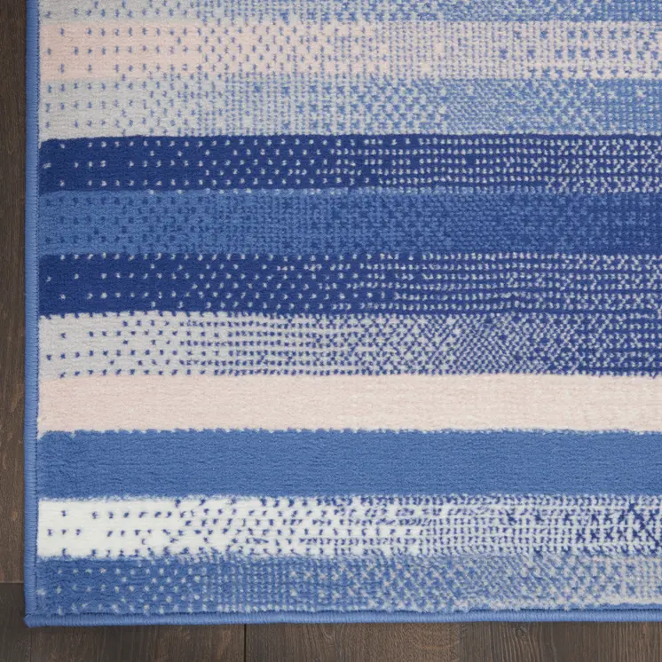 8' X 10' Ivory Tan and Blue Abstract Distressed Non Skid Area Rug