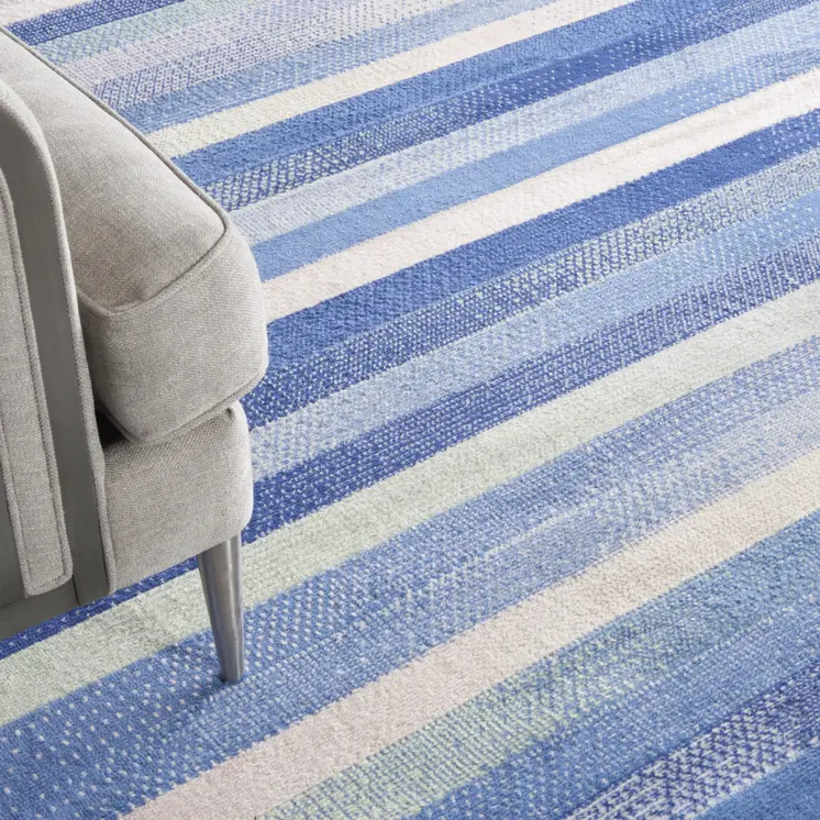 8' X 10' Ivory Tan and Blue Abstract Distressed Non Skid Area Rug