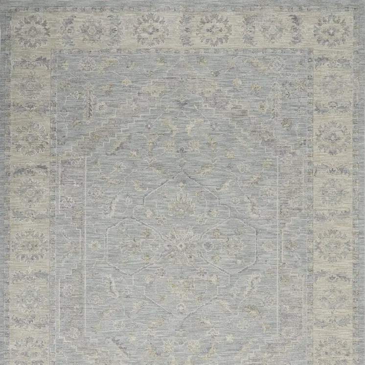 8' X 10' Teal and Ivory Floral Power Loom Area Rug