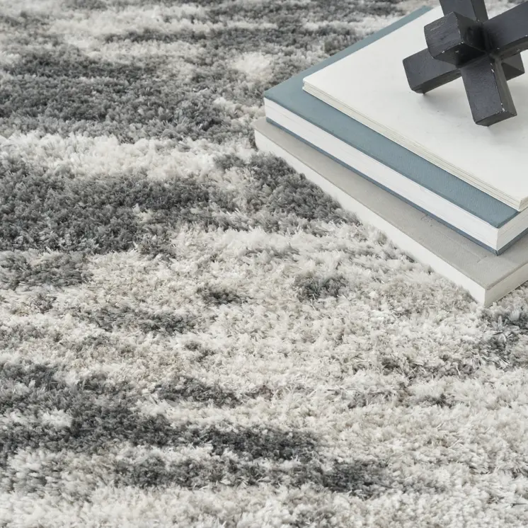 5' X 7' Charcoal and Ivory Abstract Shag Area Rug