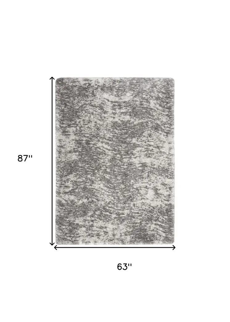 5' X 7' Charcoal and Ivory Abstract Shag Area Rug