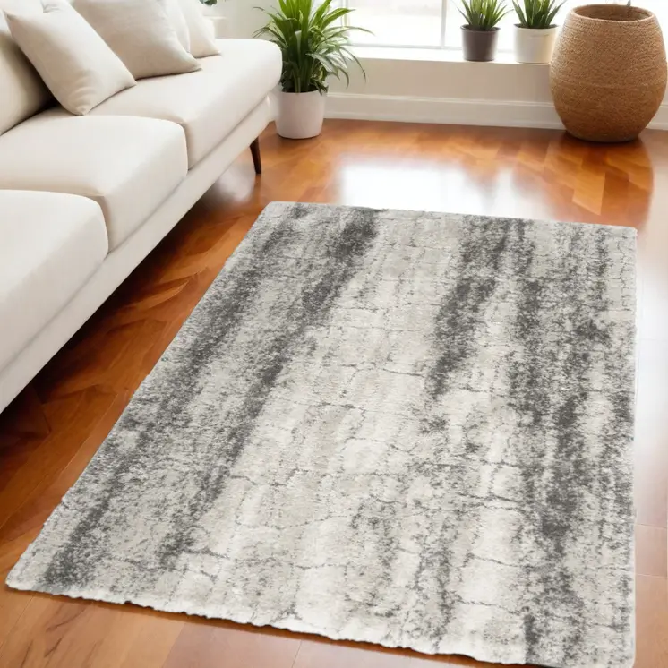 5' X 7' Charcoal and Ivory Abstract Shag Area Rug