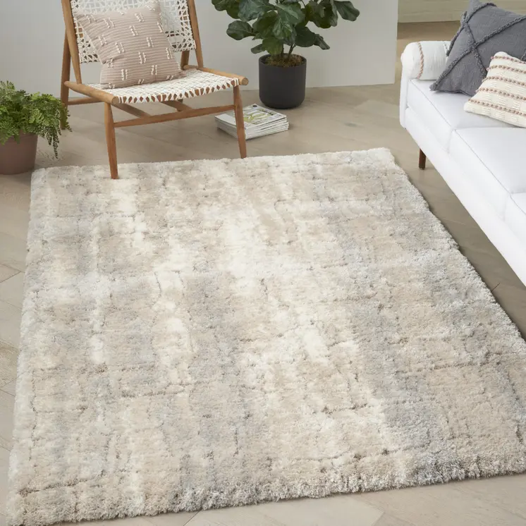 5' X 7' Beige and Ivory Abstract Shag Area Rug