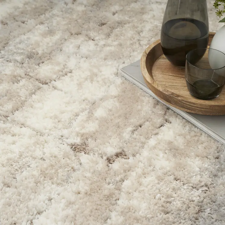 5' X 7' Beige and Ivory Abstract Shag Area Rug
