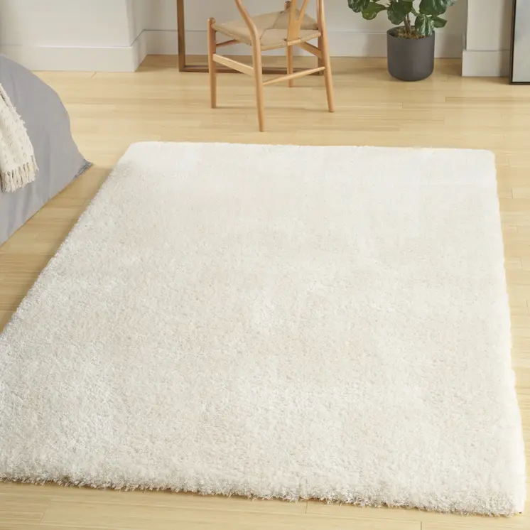 5' X 7' Cream Shag Area Rug
