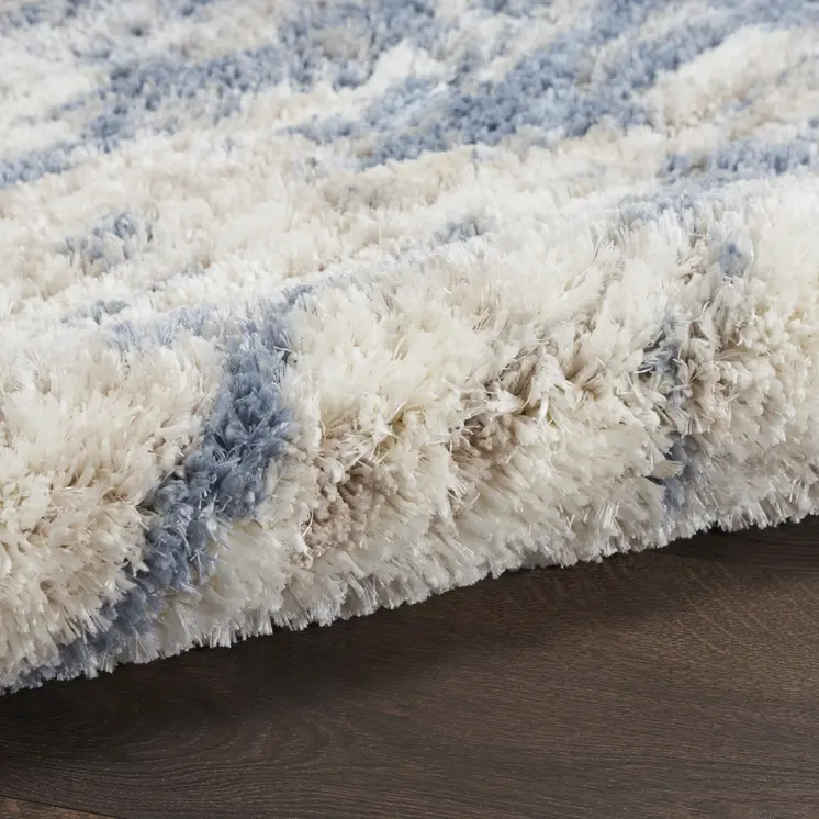 5' X 7' Light Blue Gray and Beige Abstract Shag Area Rug