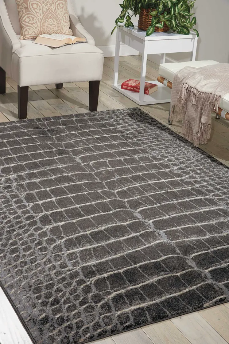 8' X 11' Beige Charcoal and Cream Animal Print Distressed Non Skid Area Rug
