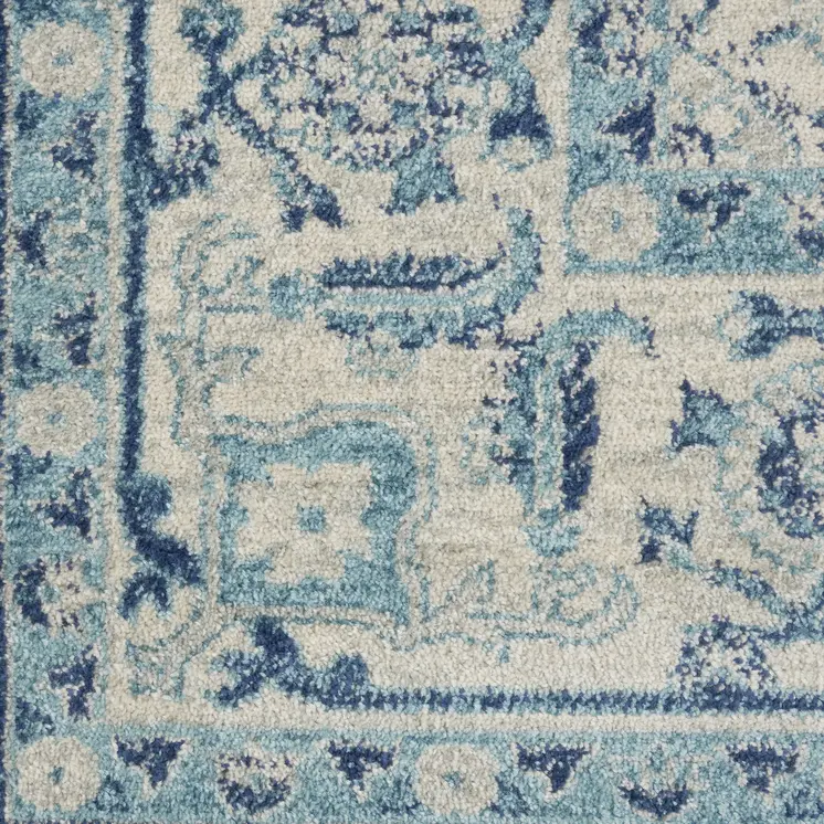 8' X 10' Ivory And Navy Blue Floral Medallion Distressed Area Rug