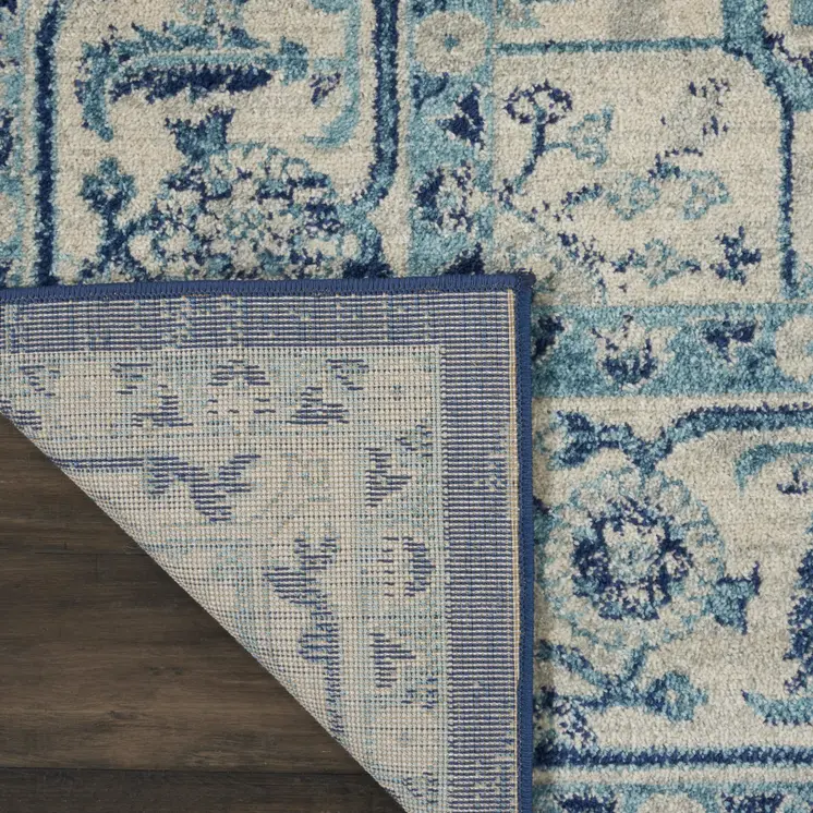 8' X 10' Ivory And Navy Blue Floral Medallion Distressed Area Rug
