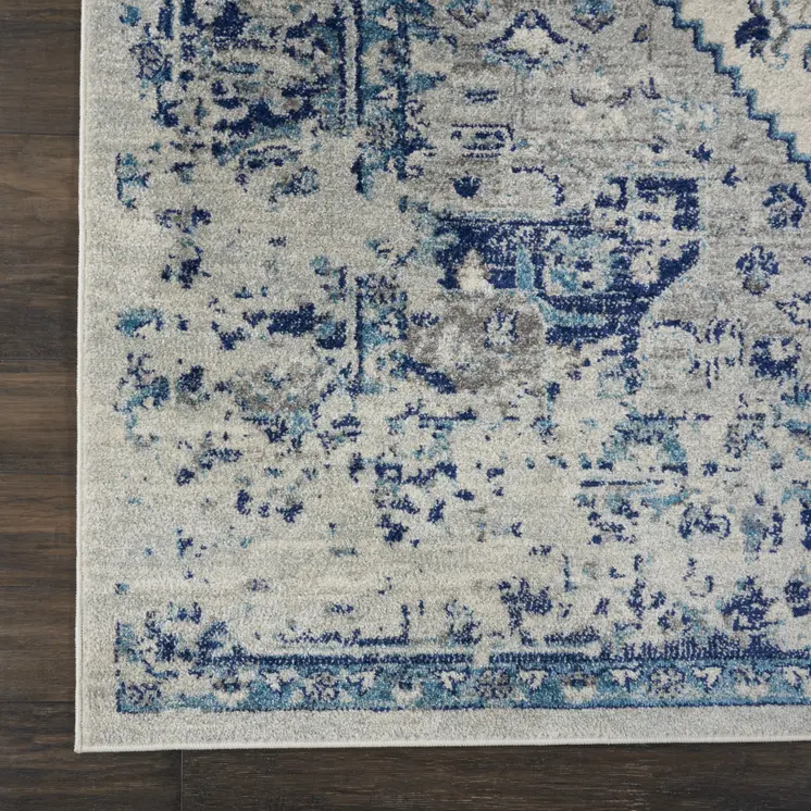 8' X 10' Ivory And Light Blue Floral Medallion Distressed Area Rug