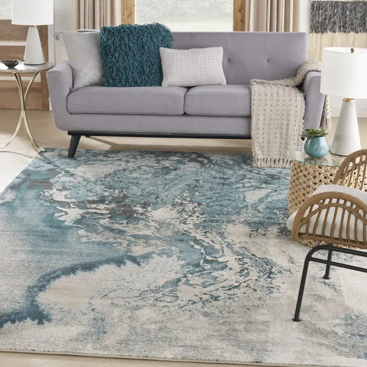 7' X 10' Ivory Teal Blue and Black Abstract Non Skid Area Rug