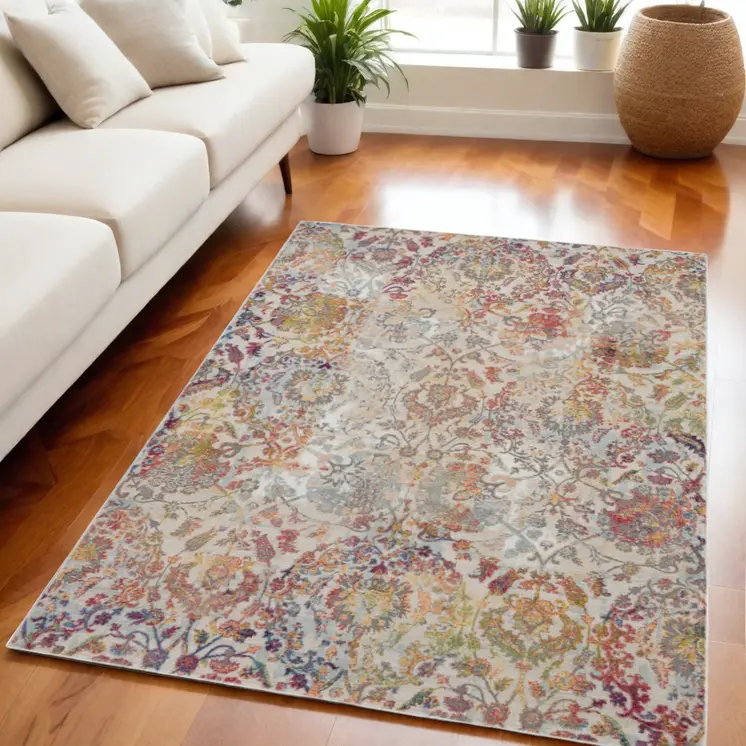 5' X 8' Ivory Gray and Orange Floral Distressed Non Skid Area Rug