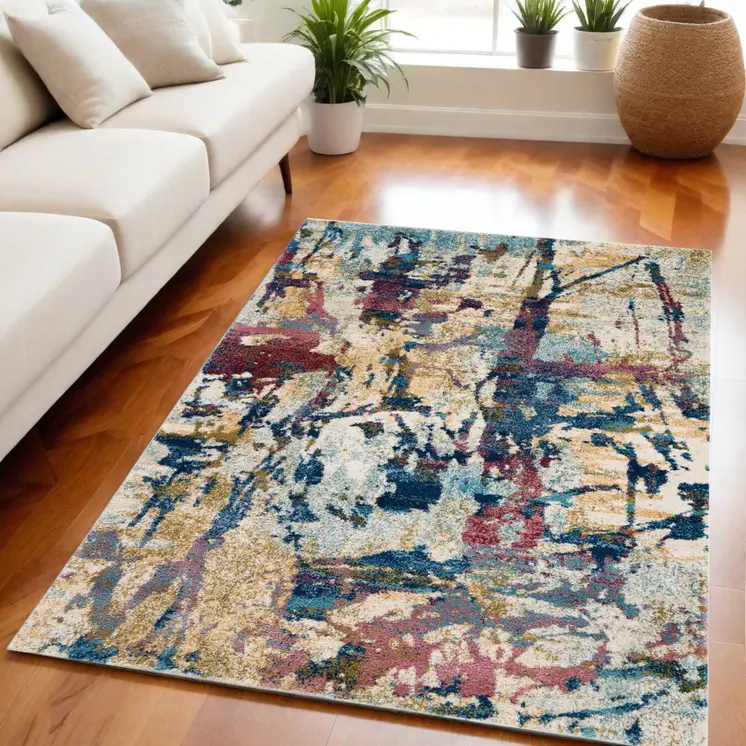 5' X 7' Cream Blue and Green Abstract Distressed Area Rug