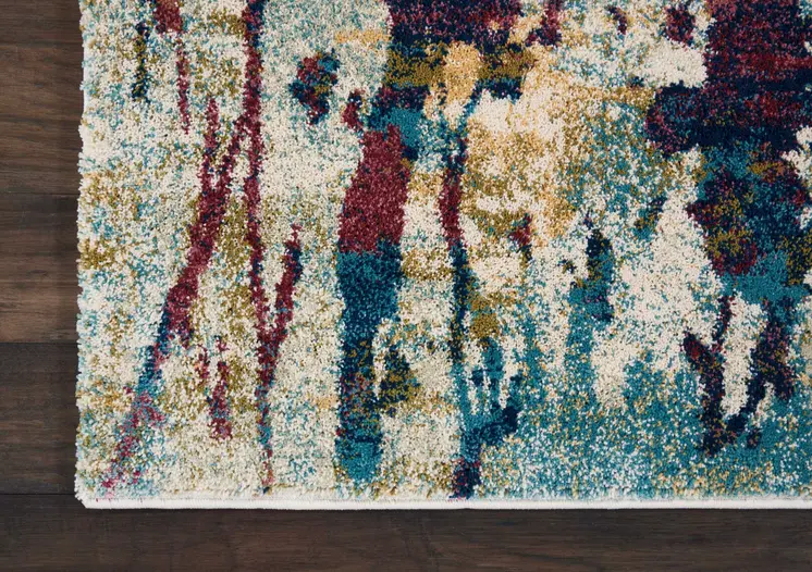 5' X 7' Cream Blue and Green Abstract Distressed Area Rug