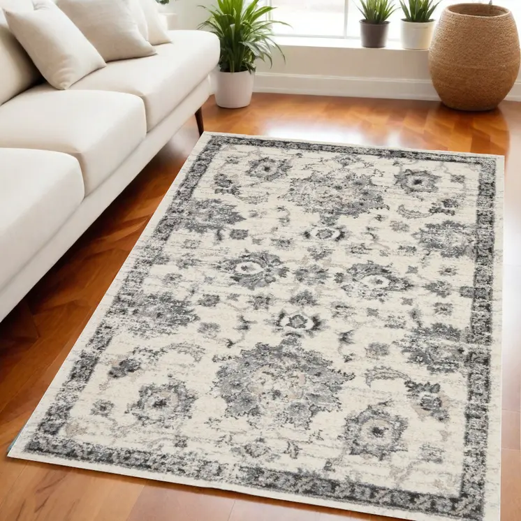 5' X 7' Cream and Gray Floral Distressed Area Rug