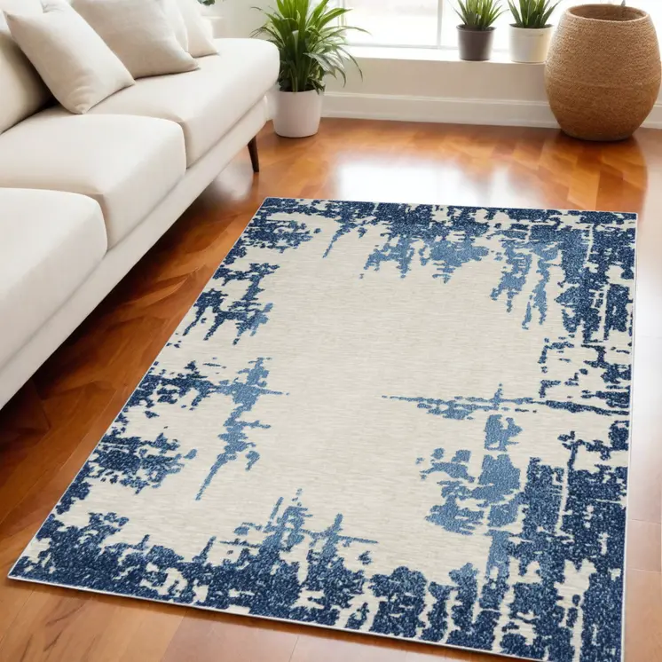5' X 7' Blue and Ivory Abstract Distressed Non Skid Area Rug