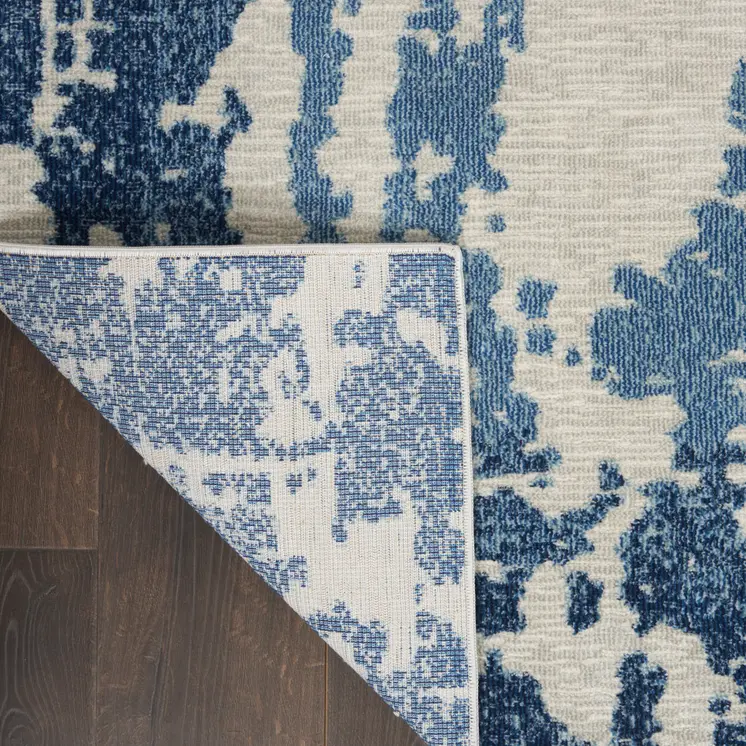 5' X 7' Blue and Ivory Abstract Distressed Non Skid Area Rug
