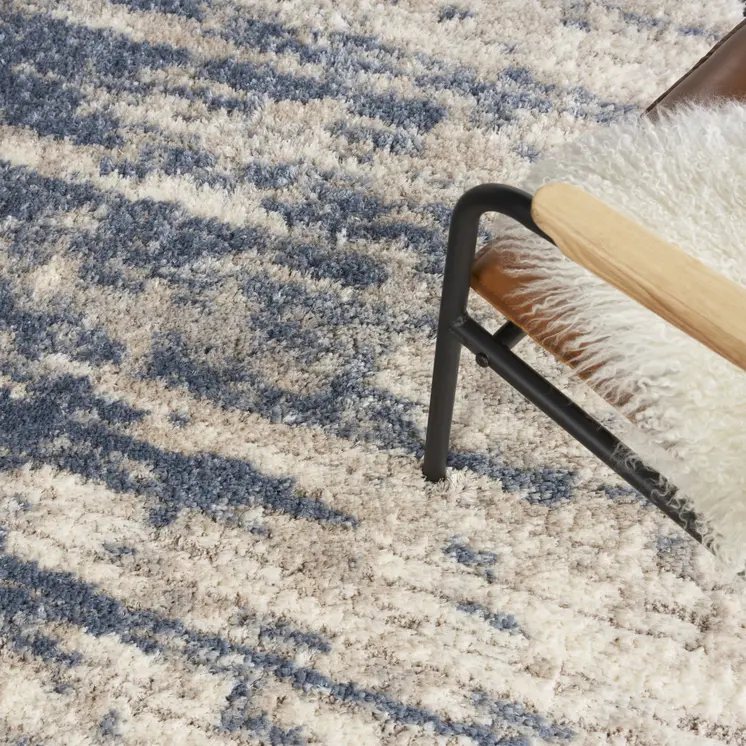 7' X 9' Light Blue Gray and Beige Abstract Shag Area Rug