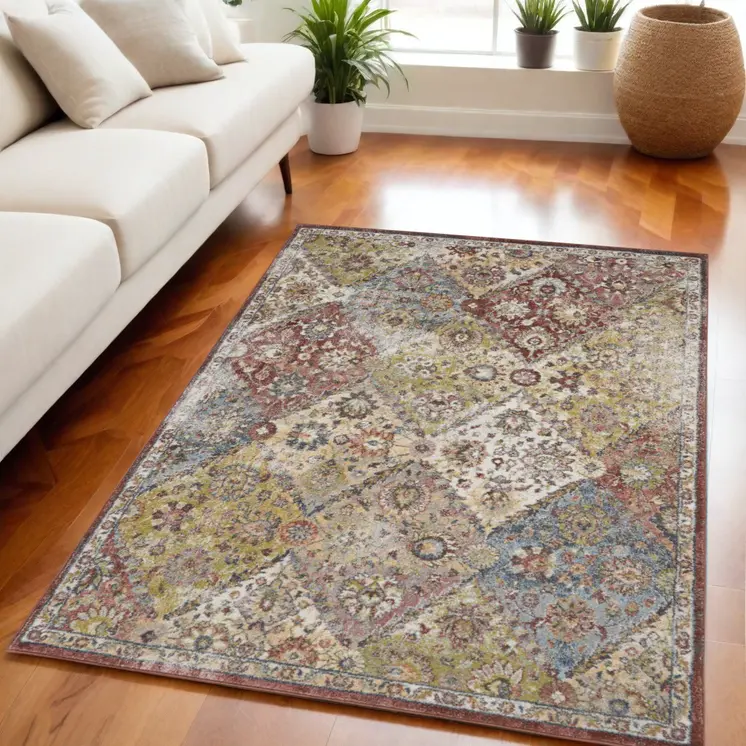 5' X 7' Green and Ivory Floral Distressed Area Rug